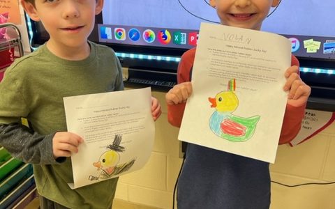 Students with duck drawings