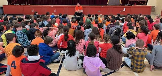 Students wearing orange